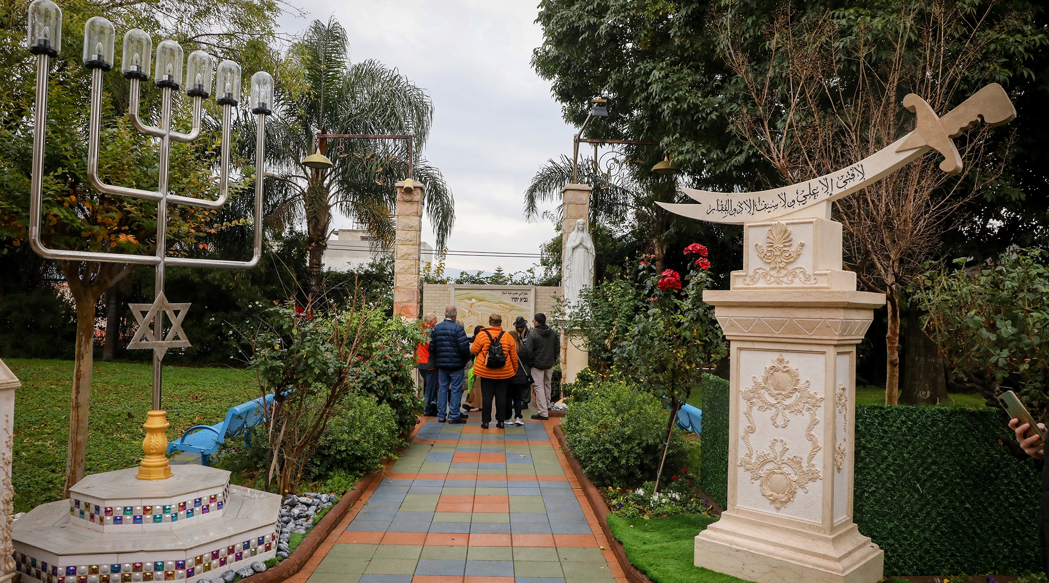 Tourists gather in the Arab village of Ghajar, on the border with Lebanon, in northern Israel, Jan. 13, 2023. (Issac Harari/Flash90)