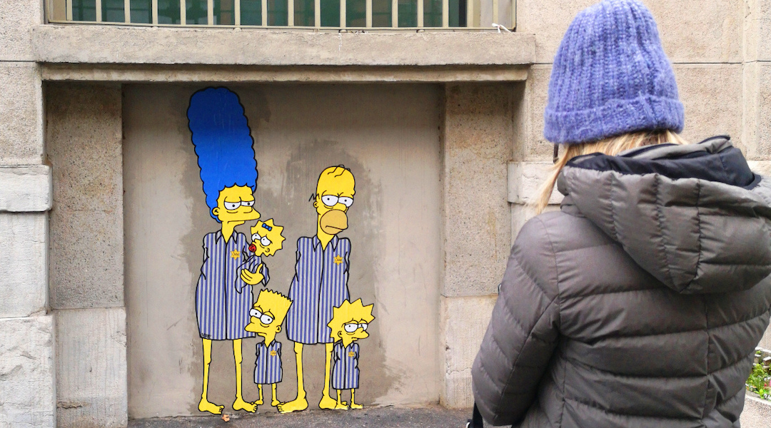 Artist aleXsandro Palombo painted several images of characters from <i>The Simpsons</i> on the outside of Milan's Holocaust memorial. 