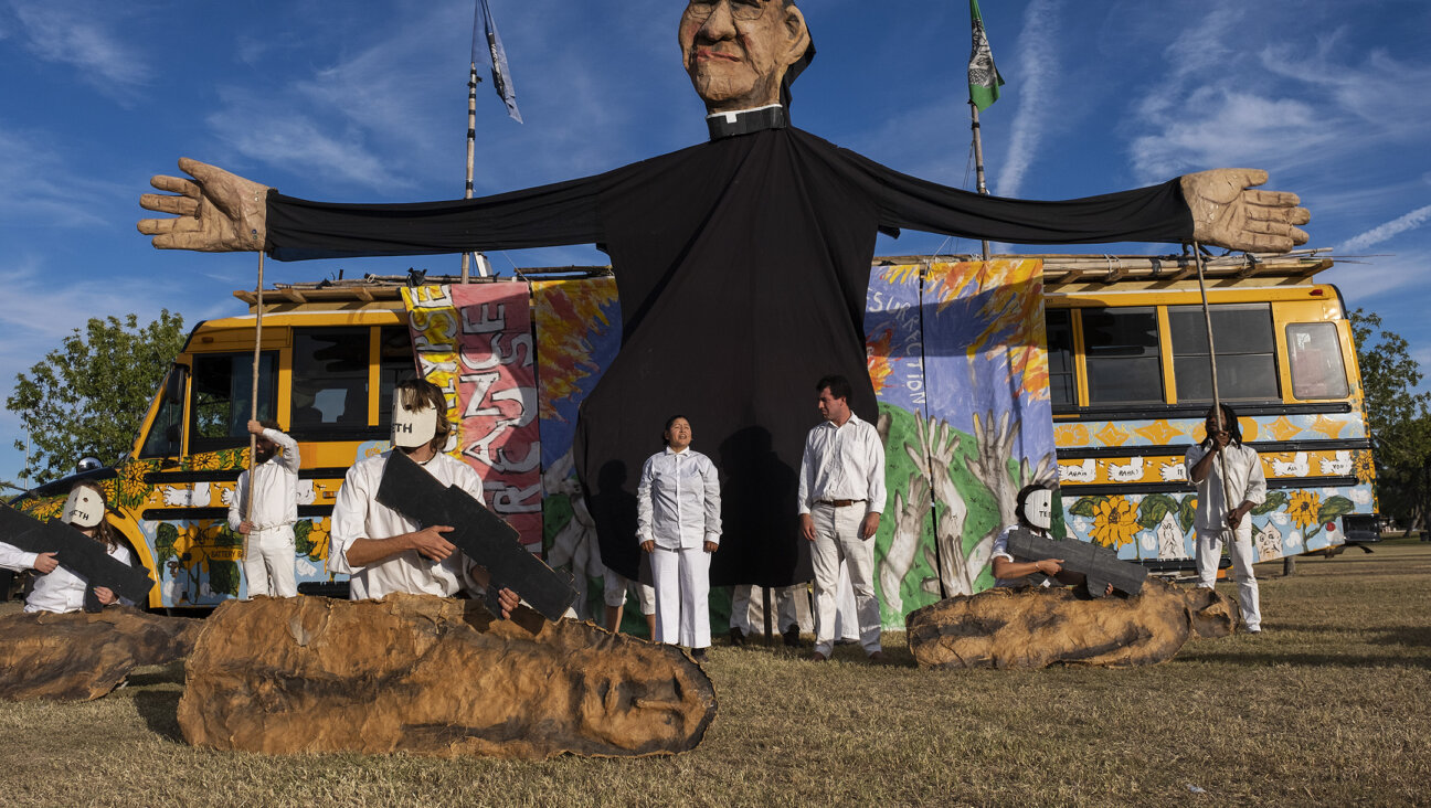 Bread and Puppet is a decidedly anti-war, anti-capitalist troupe, which has performed shows about atrocities in Vietnam, Central America, Bosnia, Afghanistan and Iraq. In this photo, a puppet portrays the late Salvadoran archbishop Oscar Romero during a performance of the 'Apocalypse Defiance Circus,' 2022. 