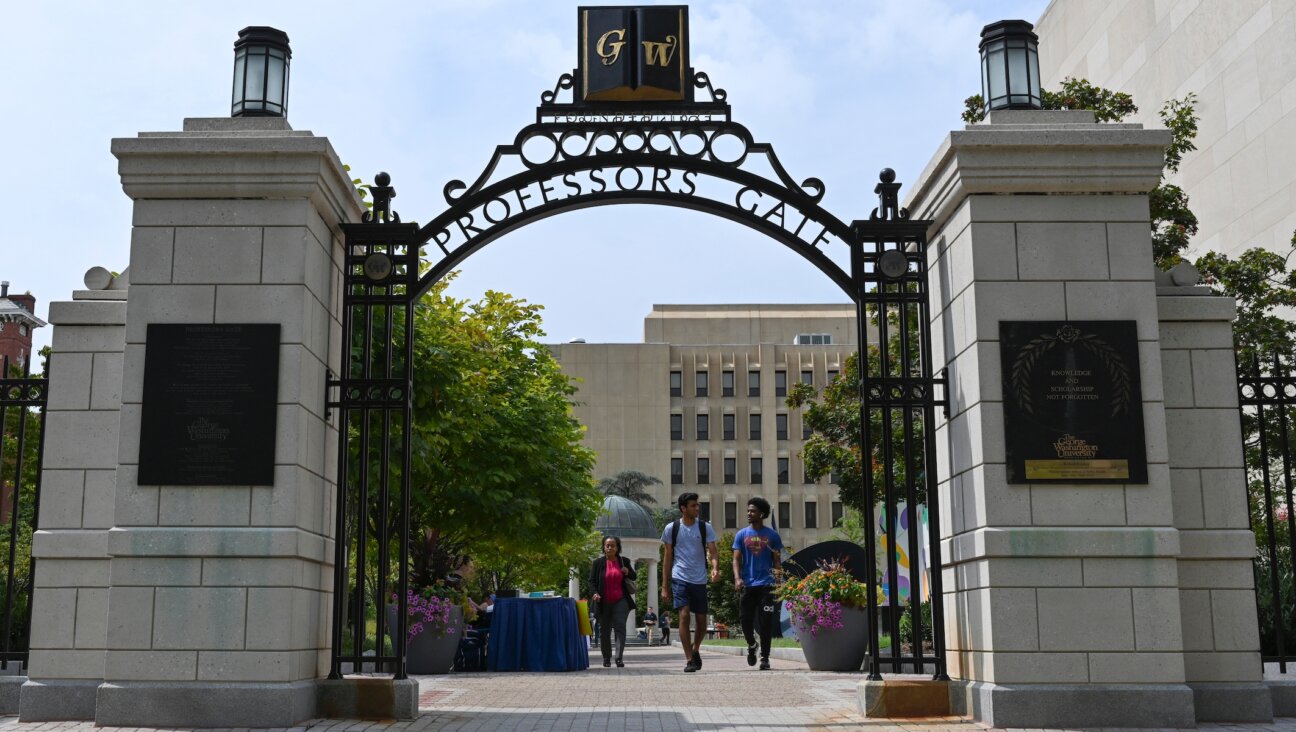 George Washington University students pass through campus. (Toni L. Sandys/The Washington Post via Getty Images)