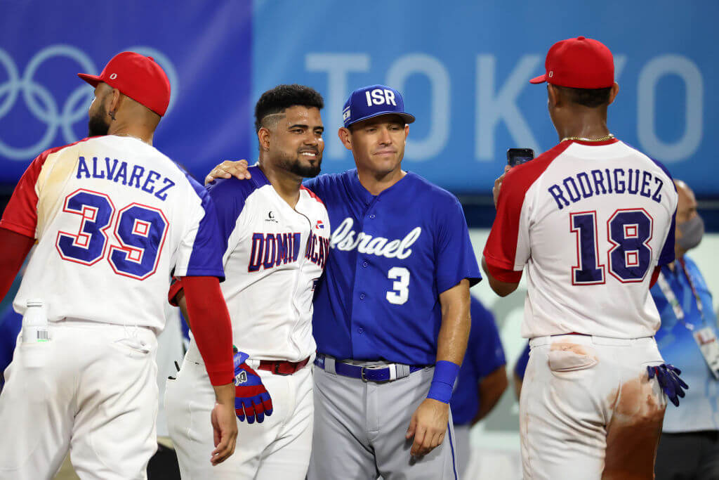 Team Israel's Ian Kinsler #3 poses for a photo with Melky Cabrera of Team Dominican Republic at the 2020 Olympics. Kinsler is now Team Israel's manager. 