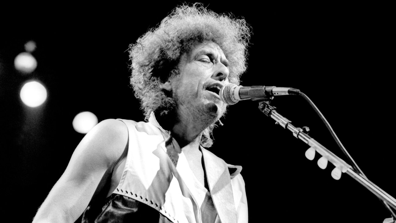 Bob Dylan performs at the "Conspiracy of Hope" concert on behalf of Amnesty International in 1986.