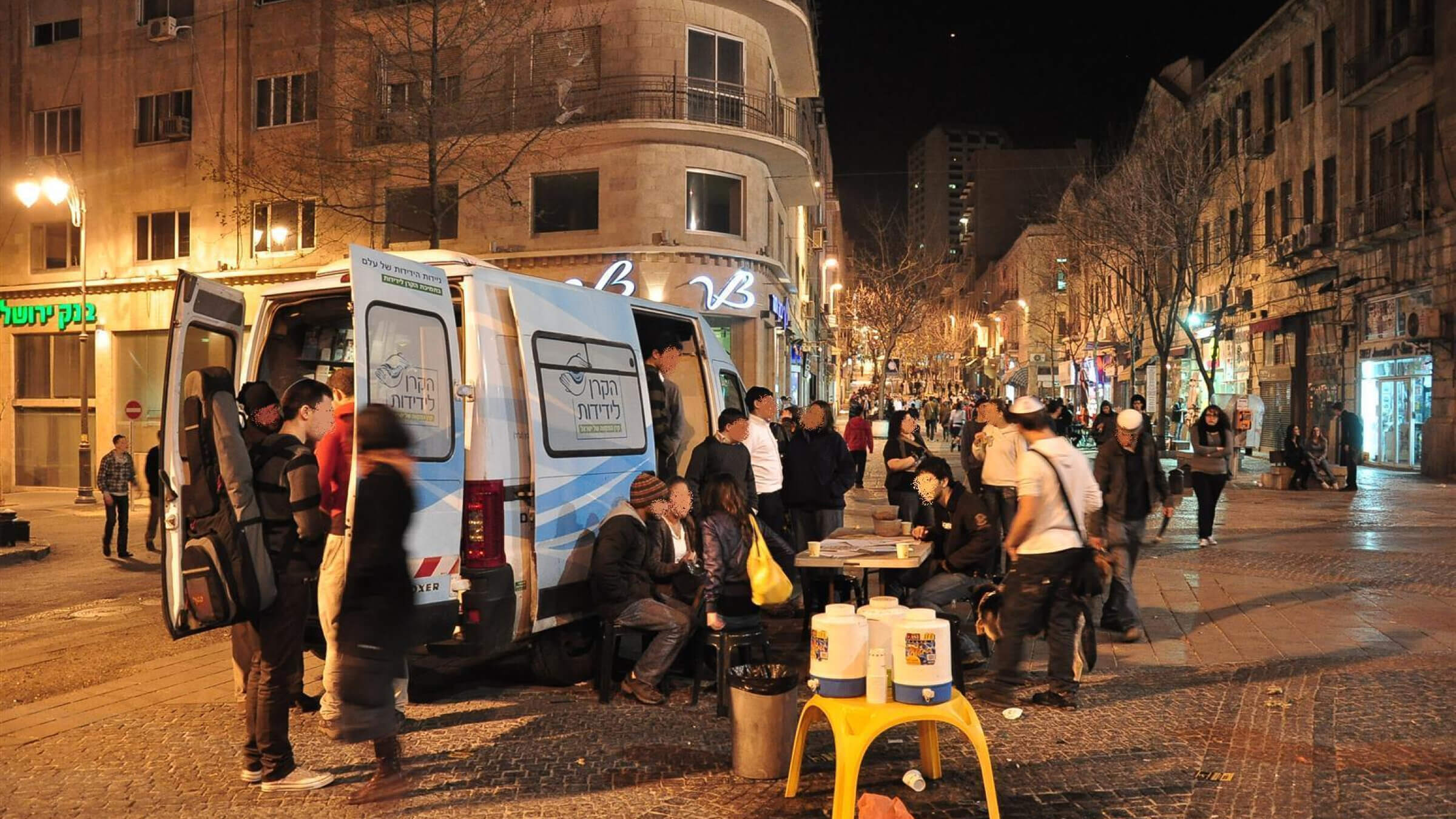 ELEM operates 15 vans that bring volunteers to 24 Israeli communities to offer at-risk youth hot drinks and the opportunity to talk.