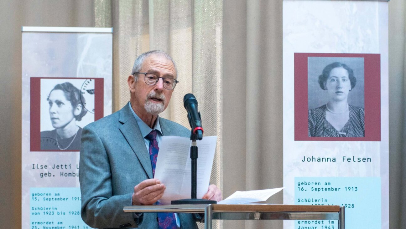 Michael Felsen speaks at the Luisengymnasium in Munich, Germany, memorializing his deceased aunt Johanna (pictured at right) on Nov. 23, 2022. Johanna and nineteen of her classmates were murdered in the Holocaust. 