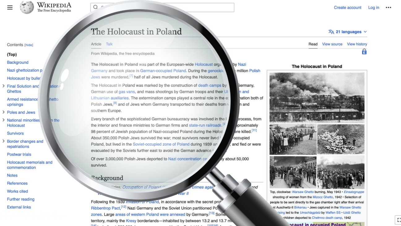 An academic paper found that a dedicated group has for some 15 years manipulated Wikipedia in ways that lay blame for the Holocaust on Jews and absolve Poland of almost any responsibility for its record of antisemitism. (JTA illustration)