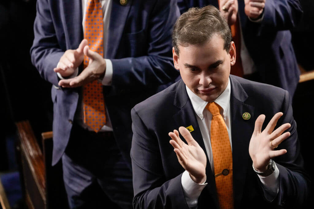 Rep. George Santos (R-N.Y.) claps during the State of the Union on Feb. 7, 2023.