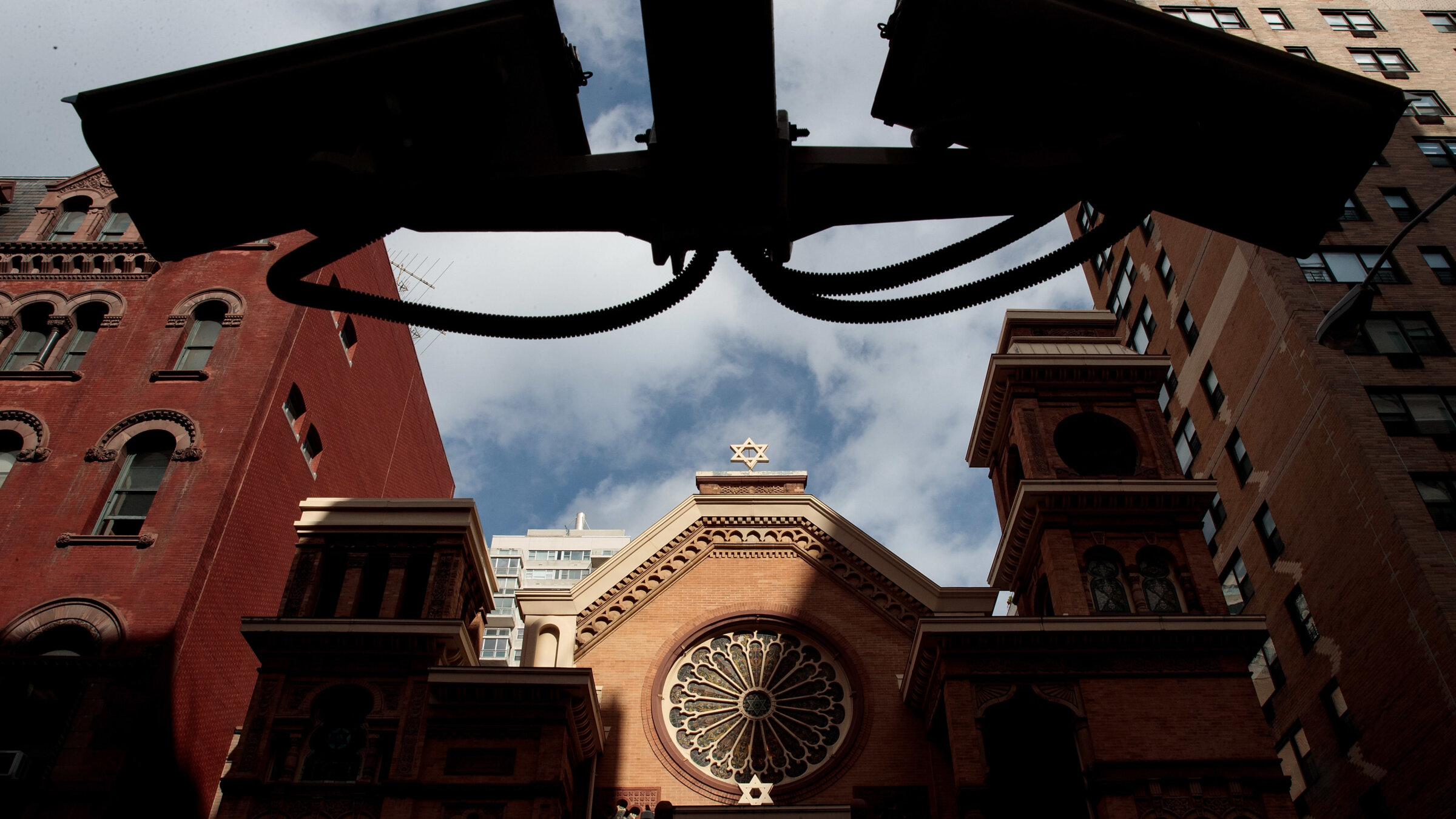 Security cameras hang across the street from the Park East Synagogue in New York City. (Drew Angerer/Getty Images)