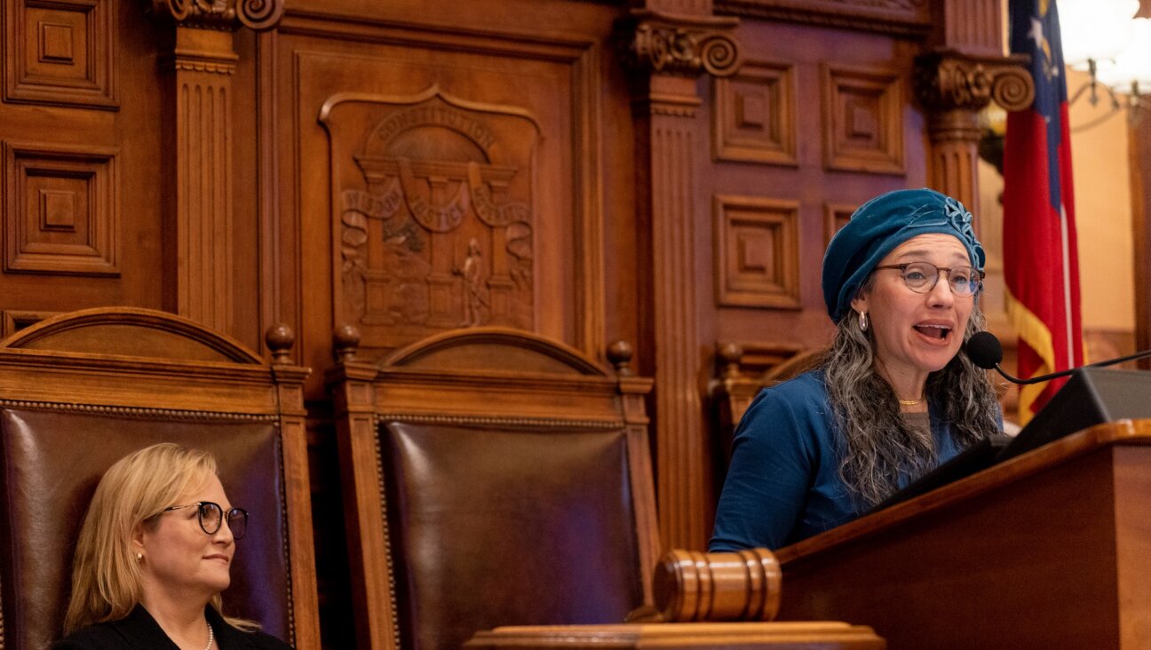 Rabbi Miriam Udel (right) and Rep. Esther Panitch in the chamber of the Georgia House of Representatives