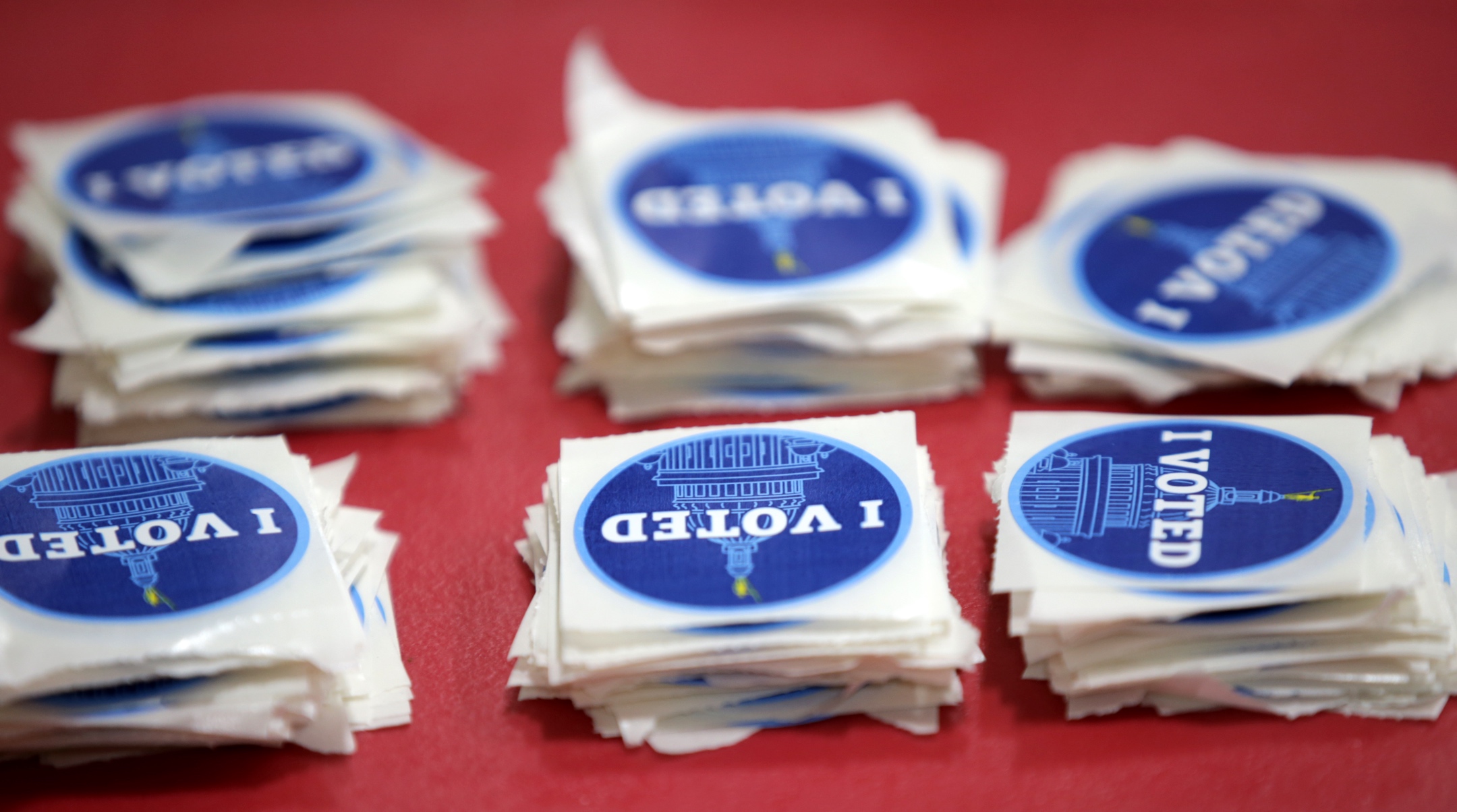 I voted stickers at the Hope Highlands Middle School polling site in Cranston, Rhode Island, Nov. 3, 2020. (Photo by Jonathan Wiggs/The Boston Globe via Getty Images)