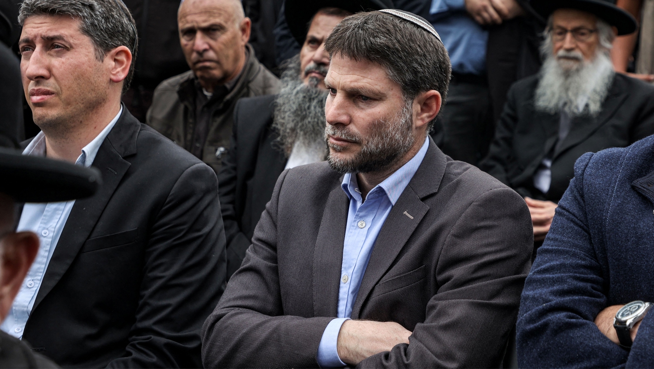 Bezalel Smotrich, the leader of Israel’s Religious Zionist Party, attends the funeral of Israeli Orthodox Jewish rabbi Chaim Druckman, a spiritual leader of the nationalist Religious Orthodox Jewish movement, at Merkaz Shapira near Kiryat Malachi, Dec. 26, 2022. (Gil Cohen-Magen/AFP via Getty Images)