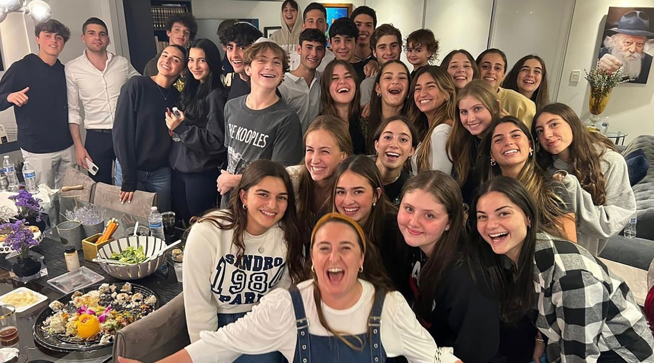 Lea Bekhar (front) and La Casa Members gather around for a picture after a Thursday after-school event. (Aviva Koenig)