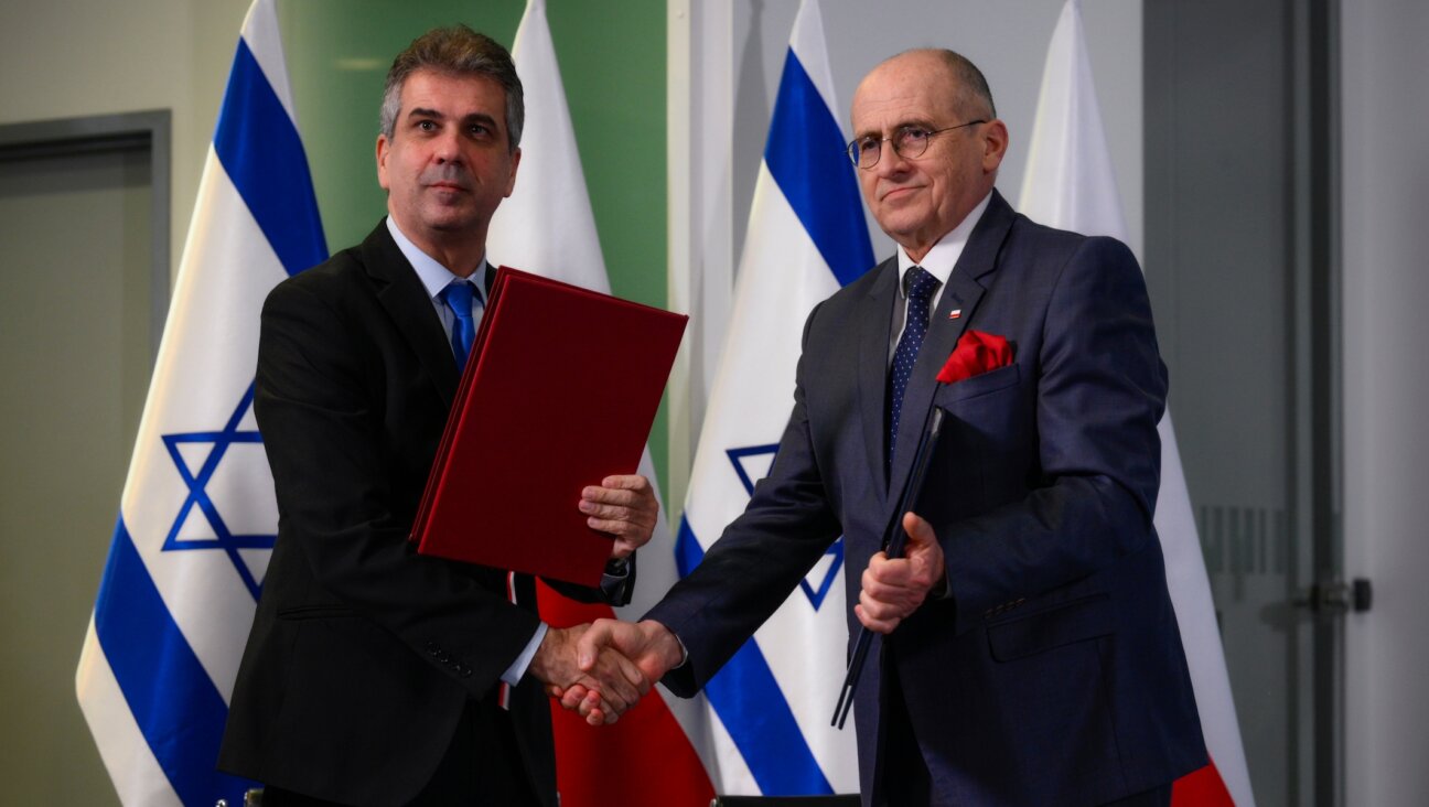 Israeli Foreign Minister Eli Cohen, left, meets with Polish Foreign Minister Zbigniew Rau in Warsaw, March 22, 2023. (Jaap Arriens/NurPhoto via Getty Images)