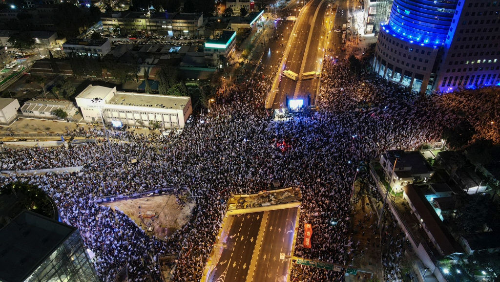 An aerial picture shows a protest against the Israeli government's controversial judicial reform bill in Tel Aviv on March 11, 2023. 