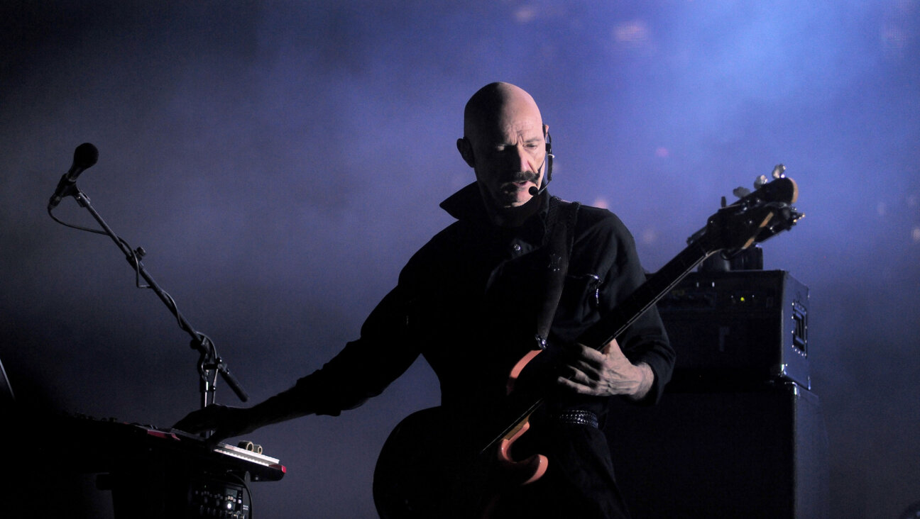 Tony Levin performs with Peter Gabriel in 2014.