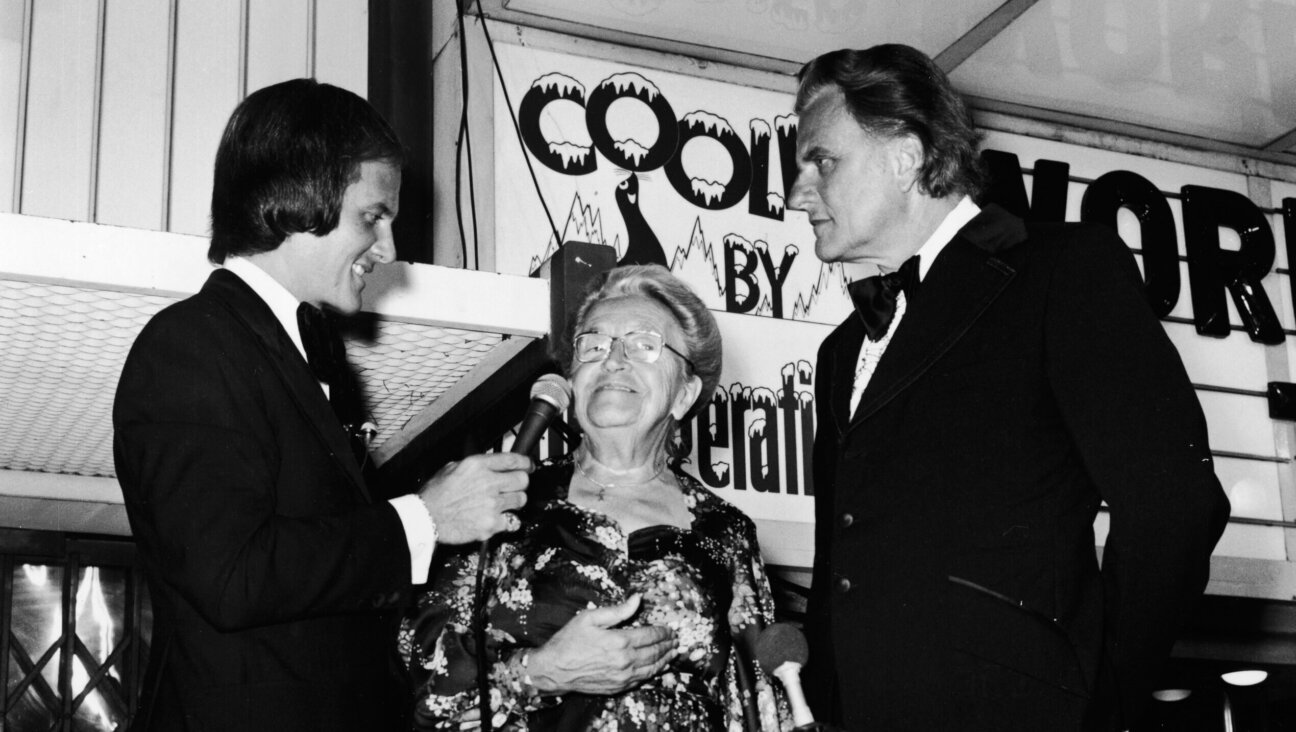 Corrie ten Boom, flanked by Pat Boone and Billy Graham at the film premiere of <i>The Hiding Place</i>, 1975.