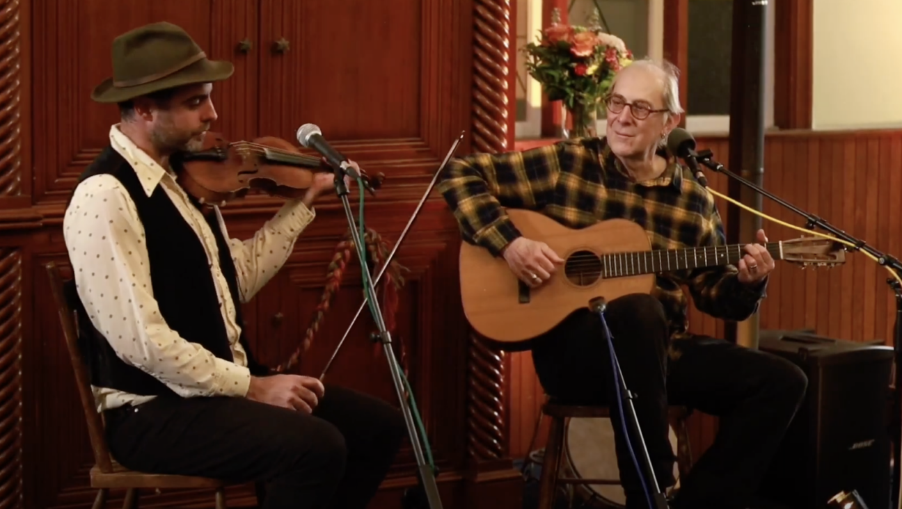 Craig Judelman and Michael Alpert perform the song "G for Beregovski.".