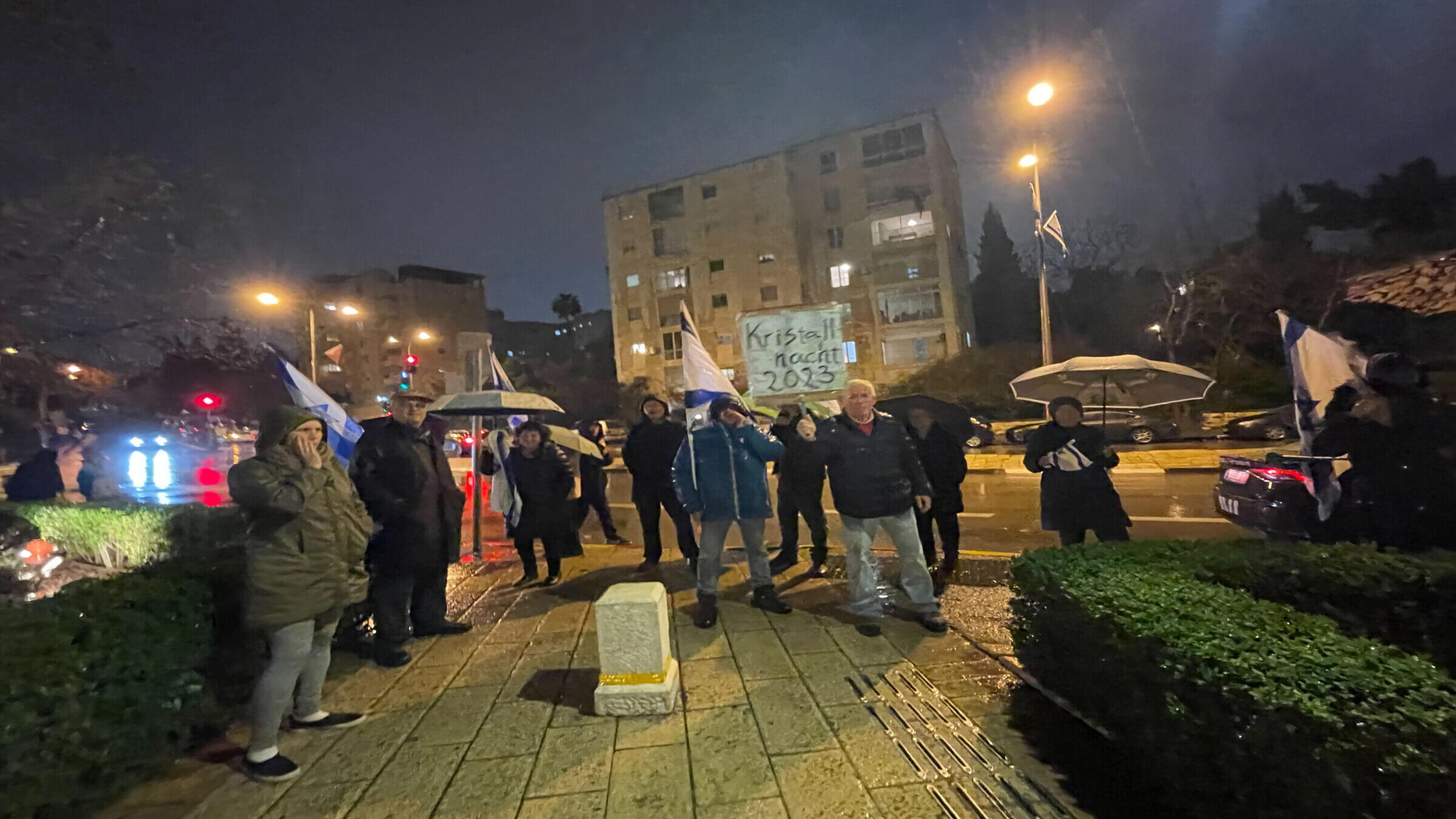 Demonstrators outside  JFNA leadership meeting in Jerusalem with head of think tank behind judicial overhaul plan on March 14, 2023.