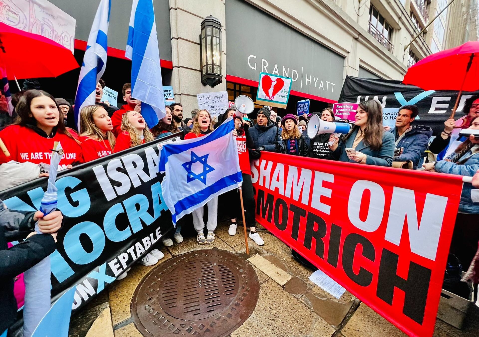 Sheila Katz, CEO of the National Council of Jewish Women, speaks to protesters Sunday night outside the Grand Hyatt hotel in Washington, D.C. (Ari Geller/West End Strategy)