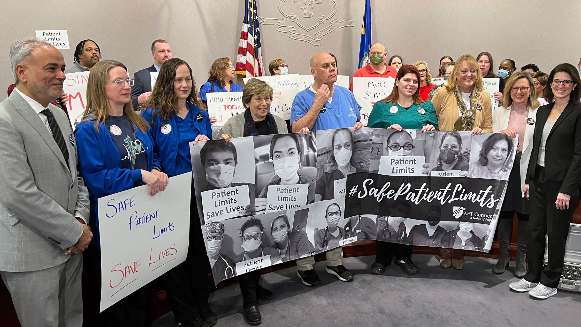 Weingarten, center, with healthcare workers at a safe-staffing briefing at the state Capitol in Hartford, Conn., on Jan. 23.