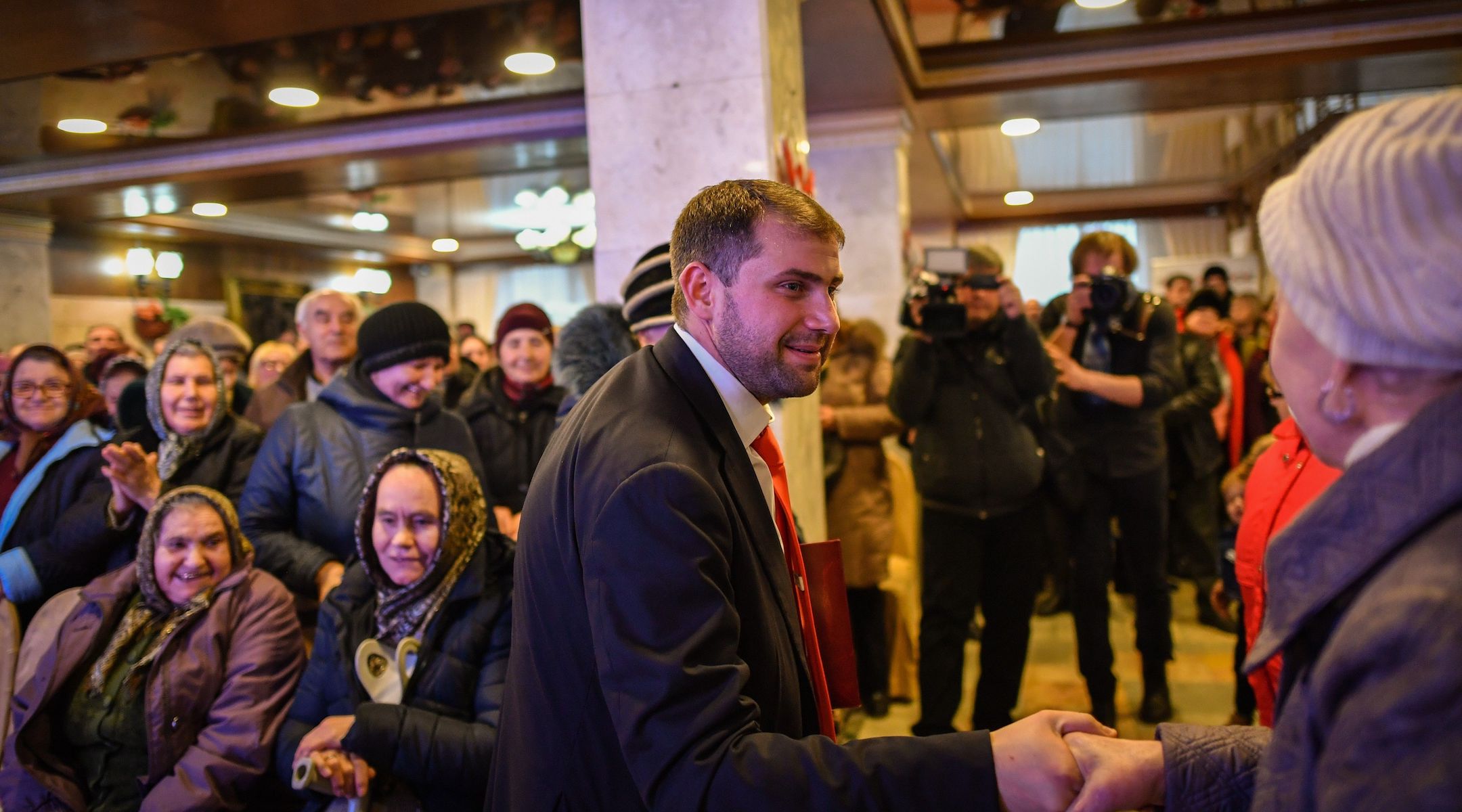 Ilan Shor, then mayor of the town of Orhei, Moldova, meets with supporters during a campaign event in the city of Comrat, Feb. 15, 2019. (Daniel Mihailescu/AFP via Getty Images)