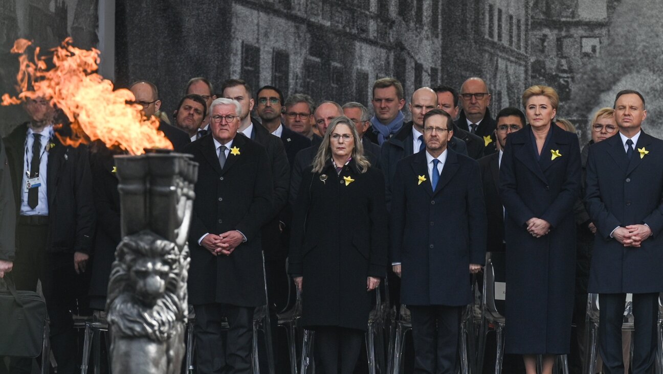 A few hundred politicians, Jewish leaders and others marked the 80th anniversary of the Warsaw Ghetto Uprising at the Ghetto Heroes Monument in Warsaw, April 19, 2023. (Artur Widak/Anadolu Agency via Getty Images)