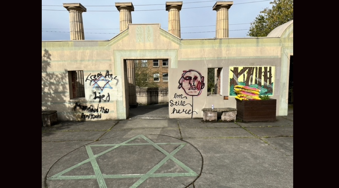 Antisemitic graffiti painted in a fenced-off area of Temple De Hirsch Sinai in Seattle, Washington, on April 16, 2023. (Courtesy of Rabbi Daniel Weiner)