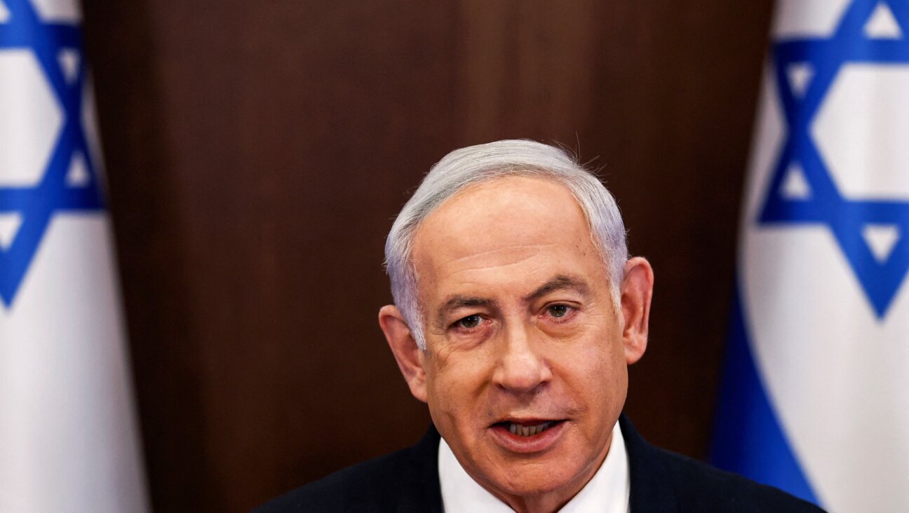 Israeli Prime Minister Benjamin Netanyahu chairs the weekly meeting at the prime minister's office in Jerusalem on April 2, 2023