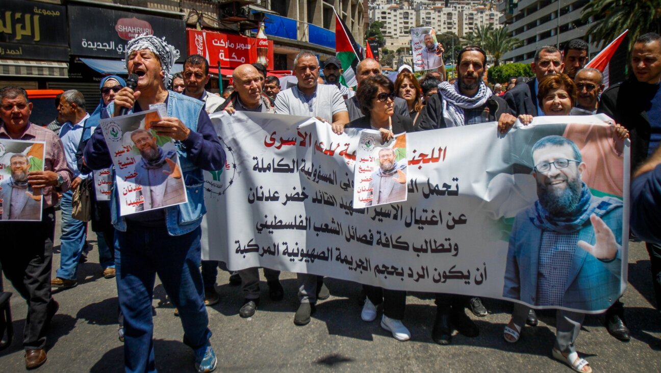 Palestinians protest following the death of Khader Adnan, a senior member of Islamic Jihad who passed away tonight after an 86-day hunger strike, in the West Bank city of Nablus, May 2, 2023. (Nasser Ishtayeh/Flash90)