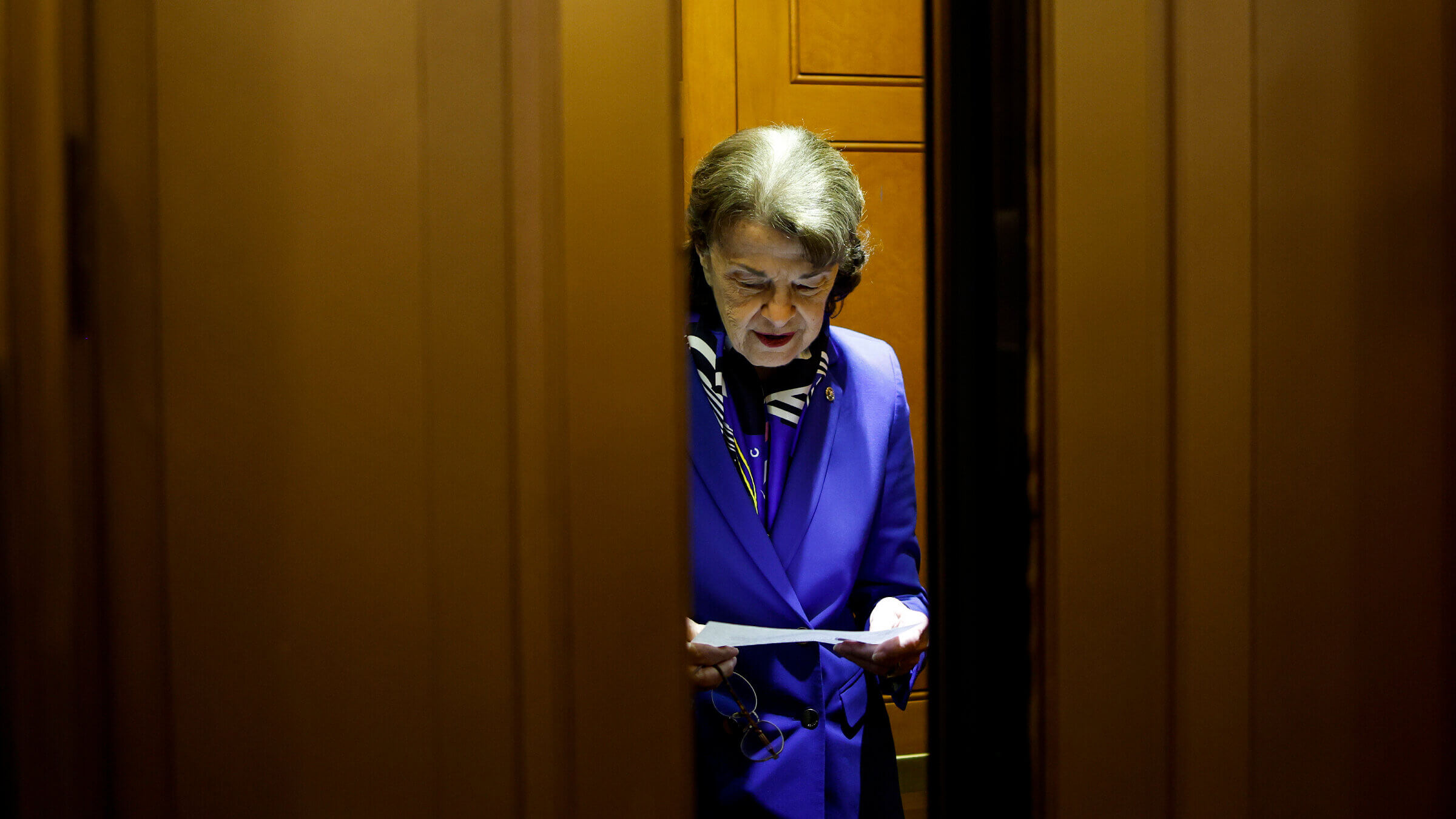 Sen. Dianne Feinstein departs from the Senate Chambers on Dec. 5, 2022. 