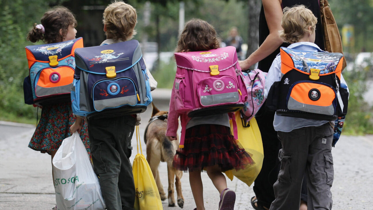 Children walk down the way on the first school day on August 23, 2010 in Berlin, Germany. 