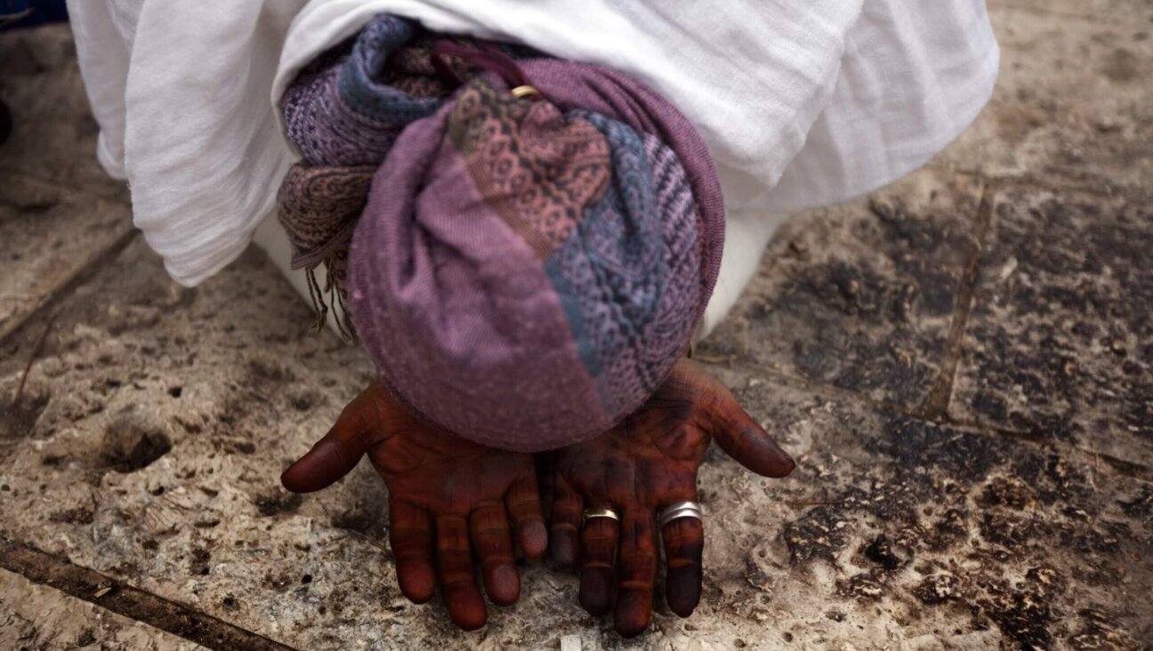 An Ethiopian Jewish women prays during the Sigd festival in Jerusalem on Nov. 16, 2009. Israel airlifted in 35,000 Ethiopian Jews under Operation Moses in 1984, at the height of a killer famine in the Horn of Africa, and during the 1991 Operation Solomon. Today, there are more than 120,000 Ethiopian Jews in Israel, 80,000 of whom were born in Africa.  