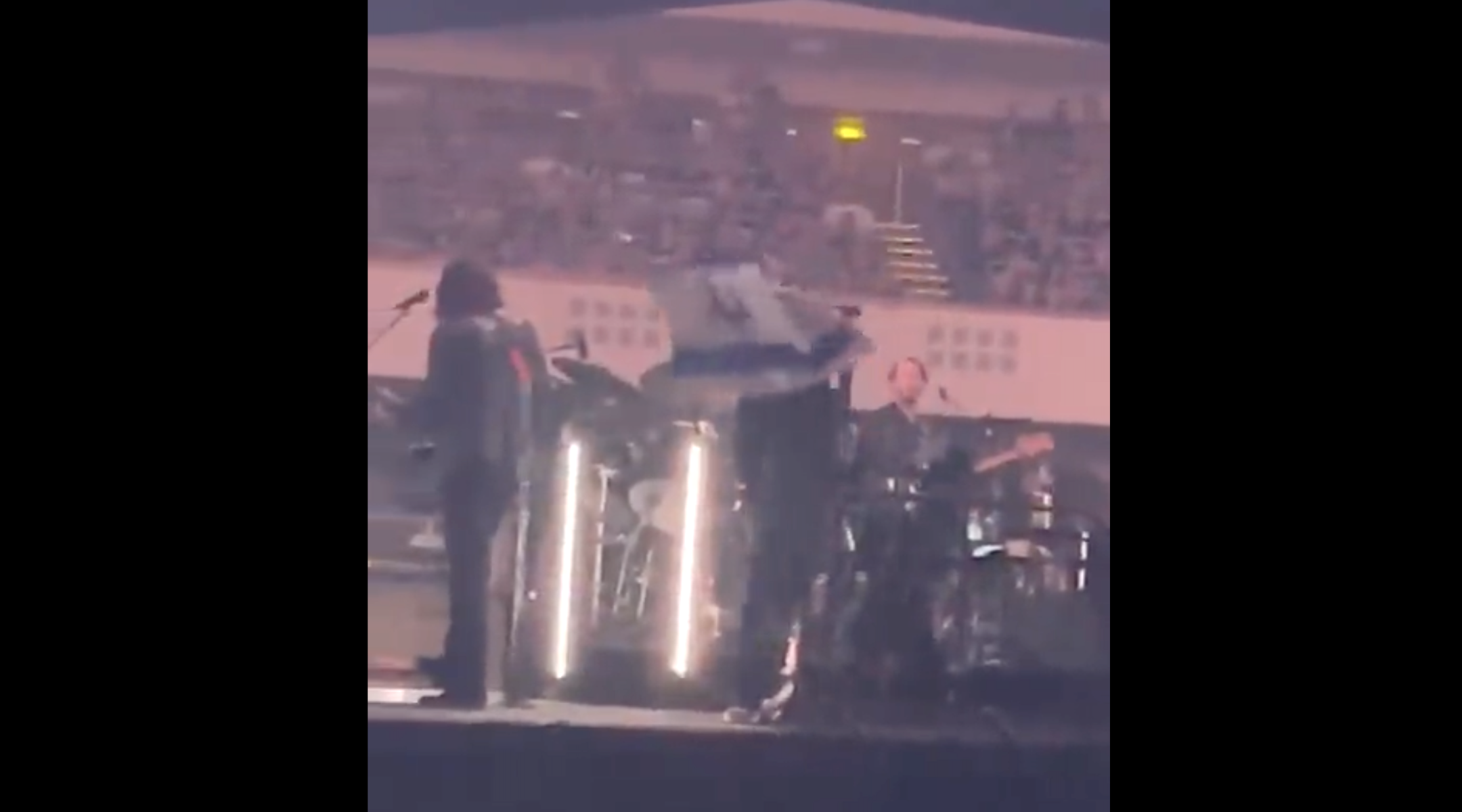 A protester waves an Israeli flag onstage at a Roger Waters concert in the Festhalle in Frankfurt, Germany, May 28, 2023. (Screenshot from Twitter)