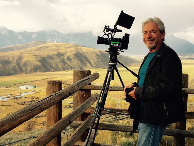 Louie Schwartzberg filming on location.