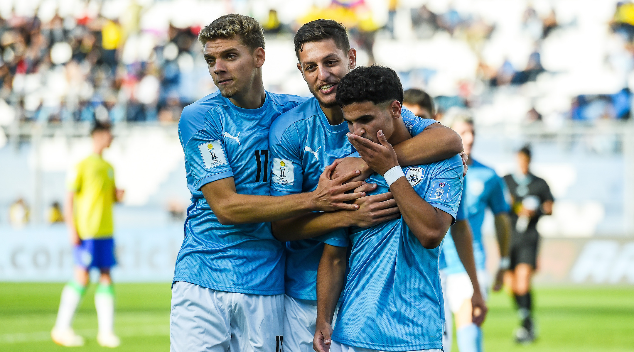 Hamza Shibli, right, celebrates with teammates after scoring against Brazil in a FIFA U-20 World Cup match in Estadio San Juan in San Juan, Argentina, June 3, 2023. (Marcelo Endelli/FIFA via Getty Images)