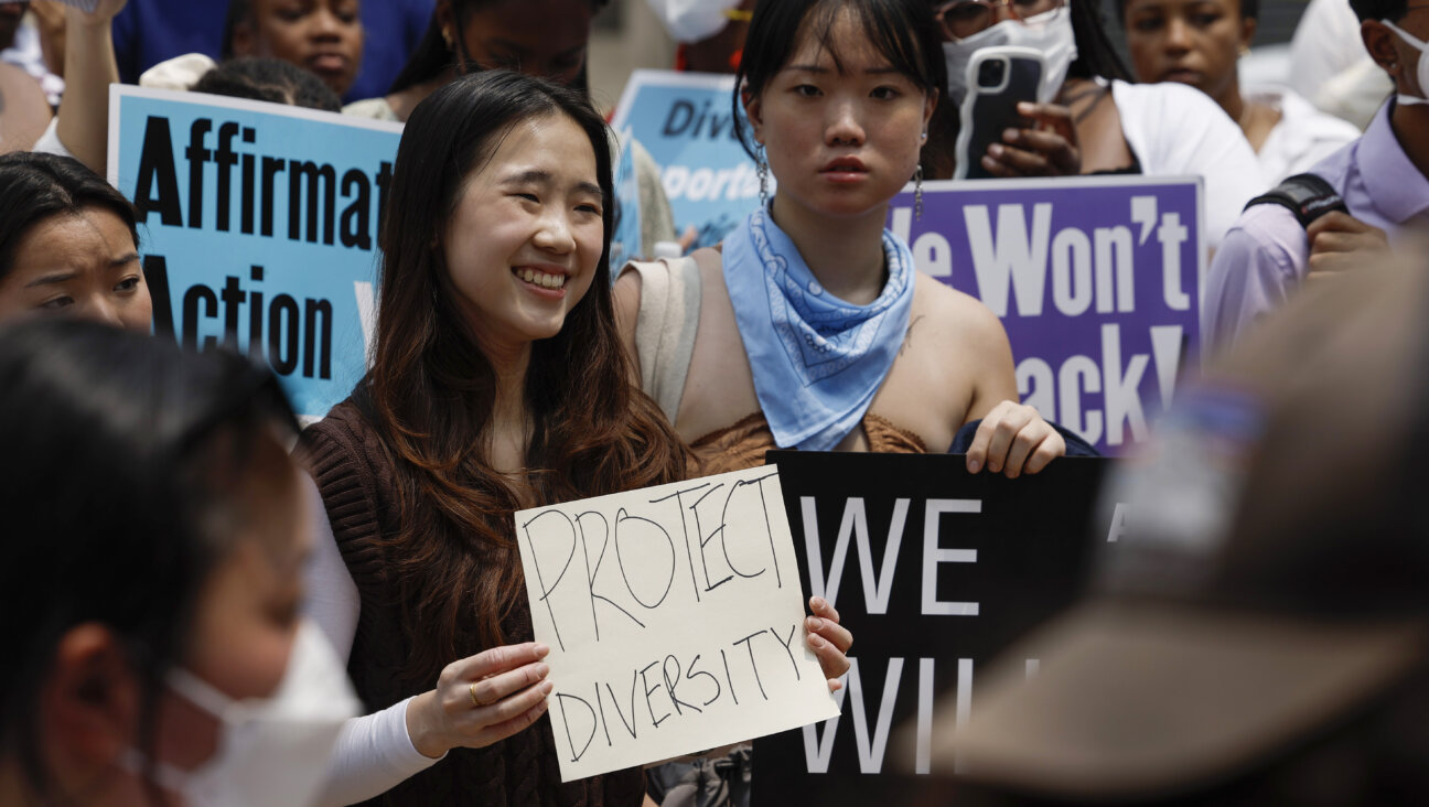 Supporters of affirmative action protest near the U.S. Supreme Court Building.