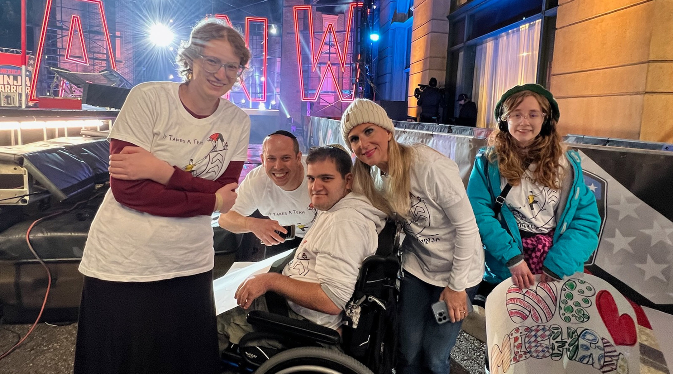 Members of the Jewish Inspiration Foundation on the set of “American Ninja Warrior.” From left to right: Chaya Ruth Weberman, Eli Casper, Ari Cohen, Esther Schwab and Aydra Jones. (Courtesy of Leah Cohen)