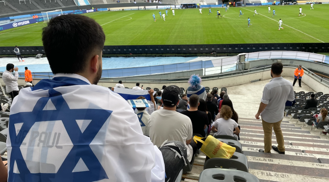 A fan wears an Israeli flag at the match between Israel and Senegal at the FIFA U-20 World Cup, in La Plata, Argentina, May 24, 2023. (Juan Melamed)