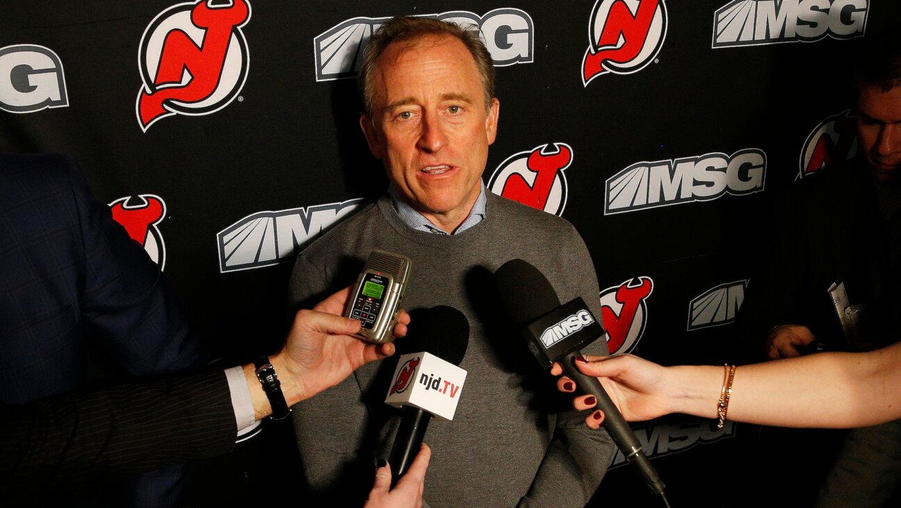 Josh Harris addresses the media at the Prudential Center in Newark, Jan. 12, 2020. (Andy Marlin/NHLI via Getty Images)