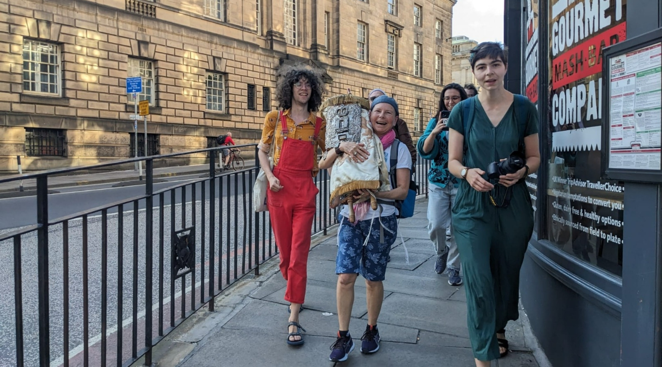 Azara participants carry a Torah scroll. (Naomi Klionsky)