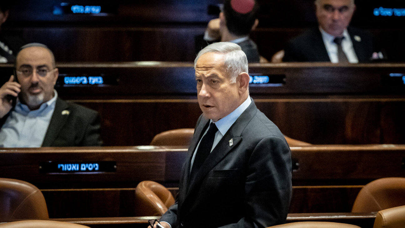 Israeli Prime Minister Benjamin Netanyahu seen during a discussion and a vote in the assembly hall of the Knesset, the Israeli parliament in Jerusalem, March 22, 2023. (Yonatan Sindel/Flash90)