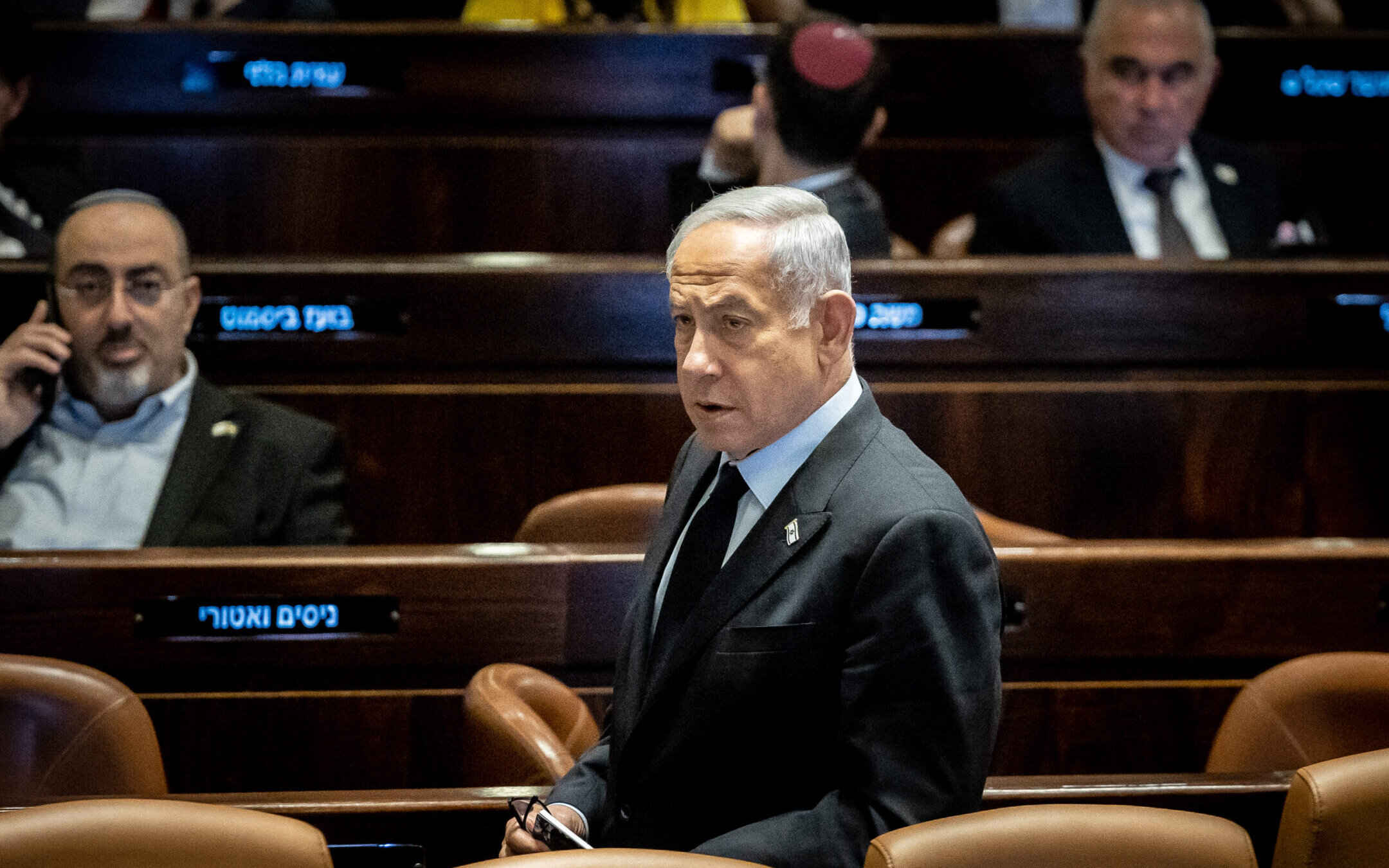 Israeli Prime Minister Benjamin Netanyahu seen during a discussion and a vote in the assembly hall of the Knesset, the Israeli parliament in Jerusalem, March 22, 2023. (Yonatan Sindel/Flash90)