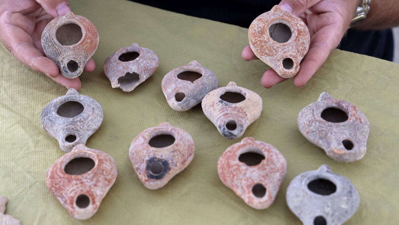 Ceramic oil lamps unearthed at the archaeological site in the Israeli city of Bet Shemesh, in 2020.