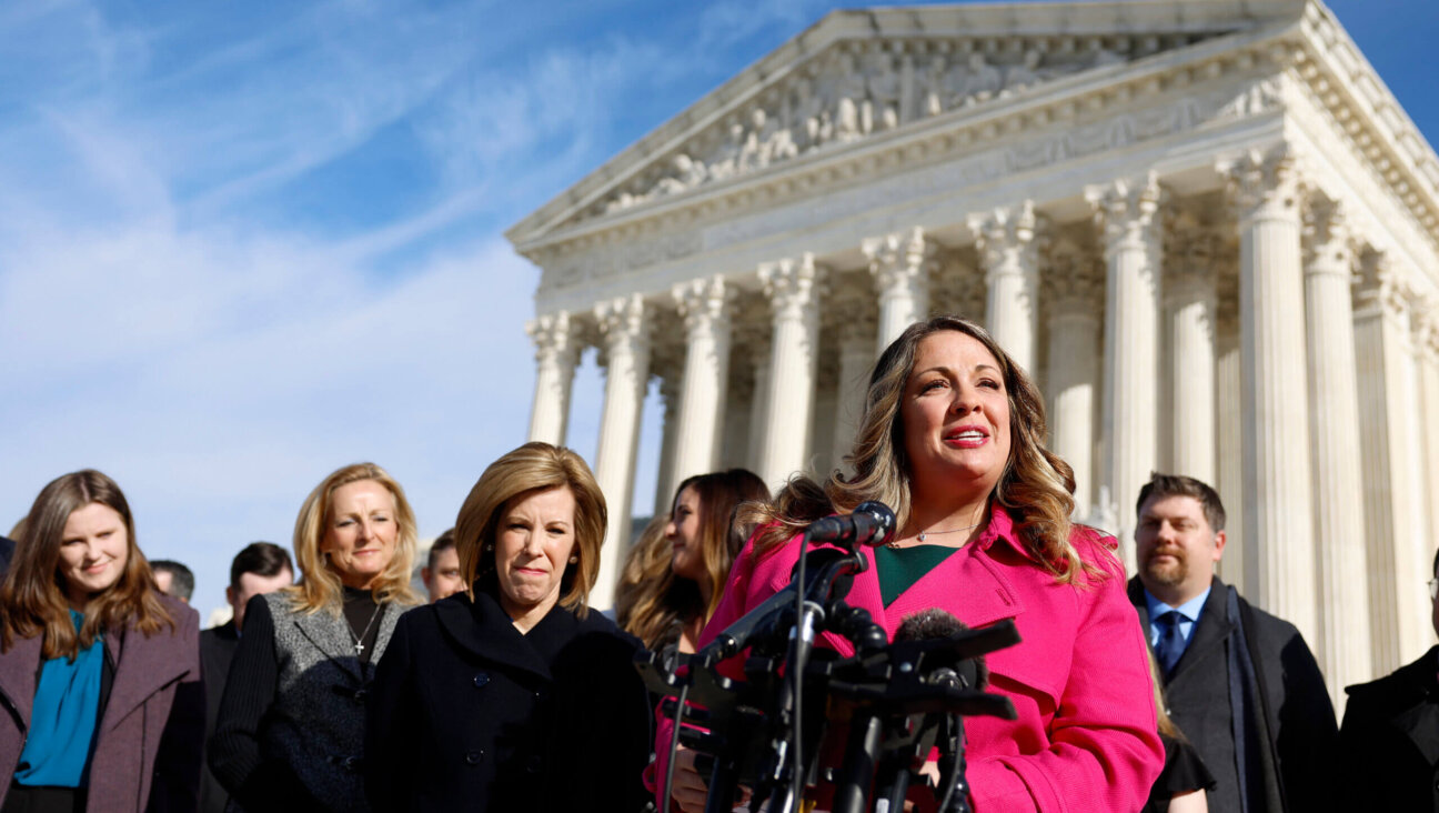 Lorie Smith, the owner of 303 Creative, a website design company in Colorado, speaks to reporters outside of the U.S. Supreme Court Building on December 05, 2022 in Washington, DC. 