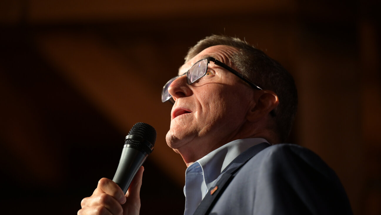 Michael Flynn, former U.S. national security adviser to former President Trump, speaks at a campaign event for U.S. Senate candidate Josh Mandel on April 21, 2022, at Mapleside Farms in Brunswick, Ohio.