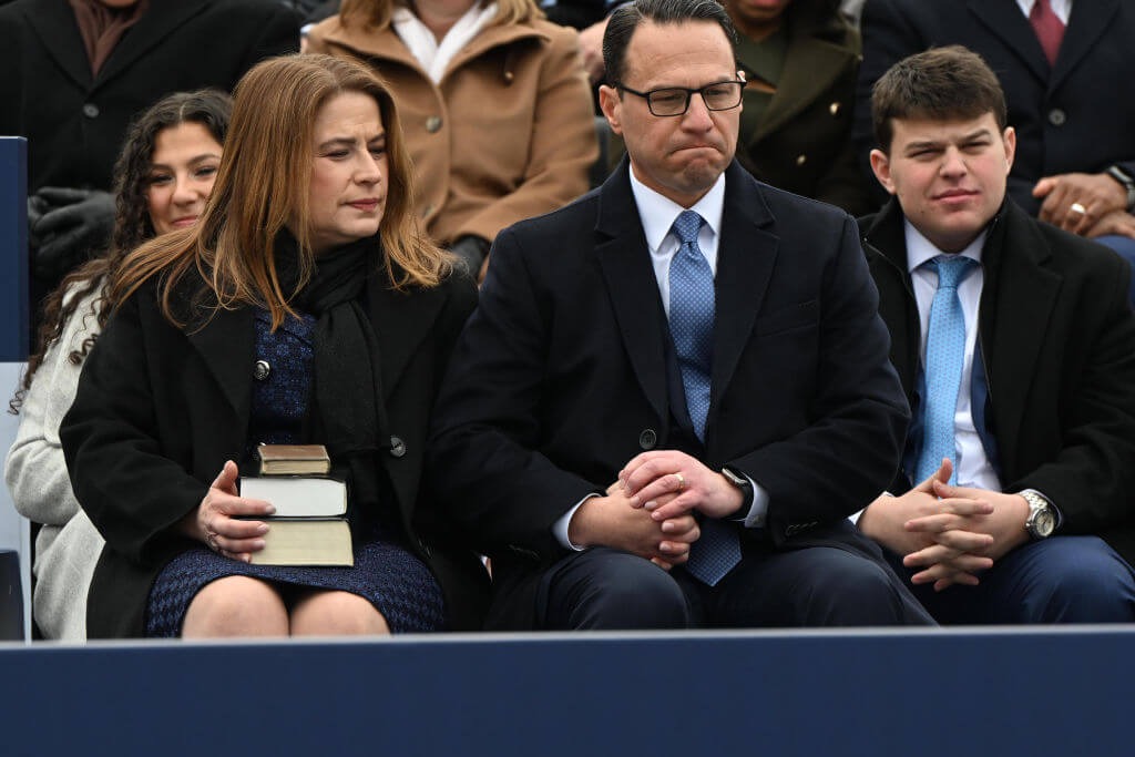 Josh Shapiro’s wife, Lori, holds three Bibles for the swearing in ceremony, including one from Tree of Life. (Getty)