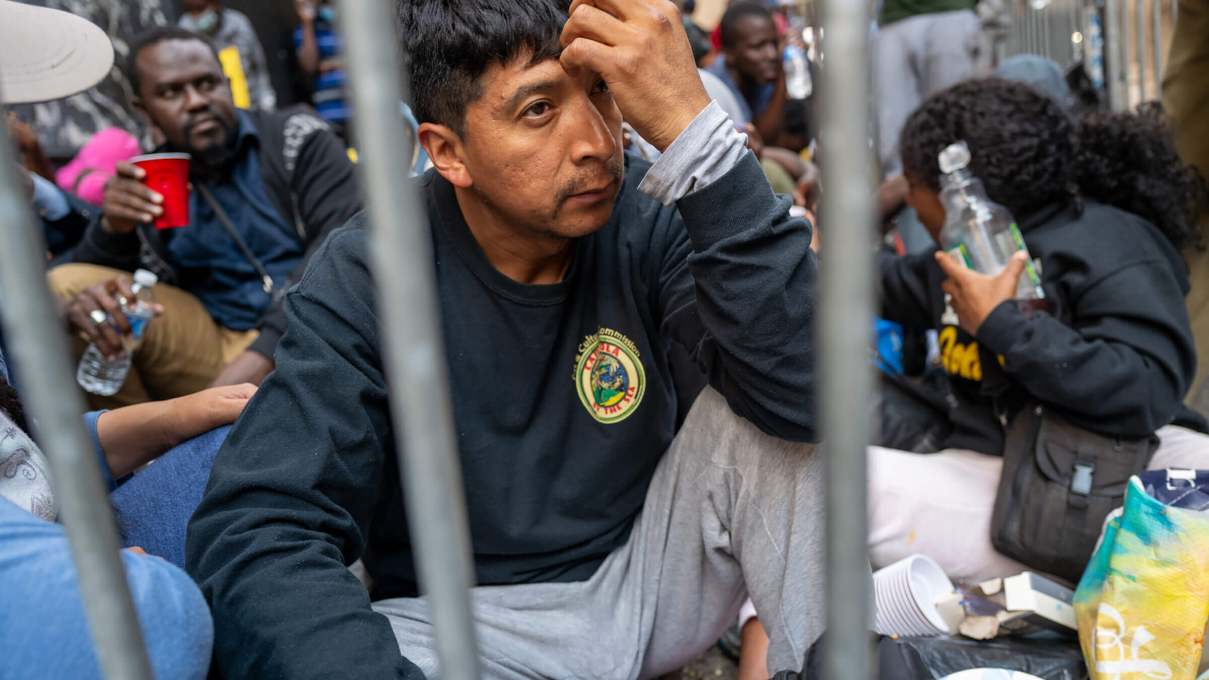 Recently arrived migrants to New York City camp outside of the Roosevelt Hotel.