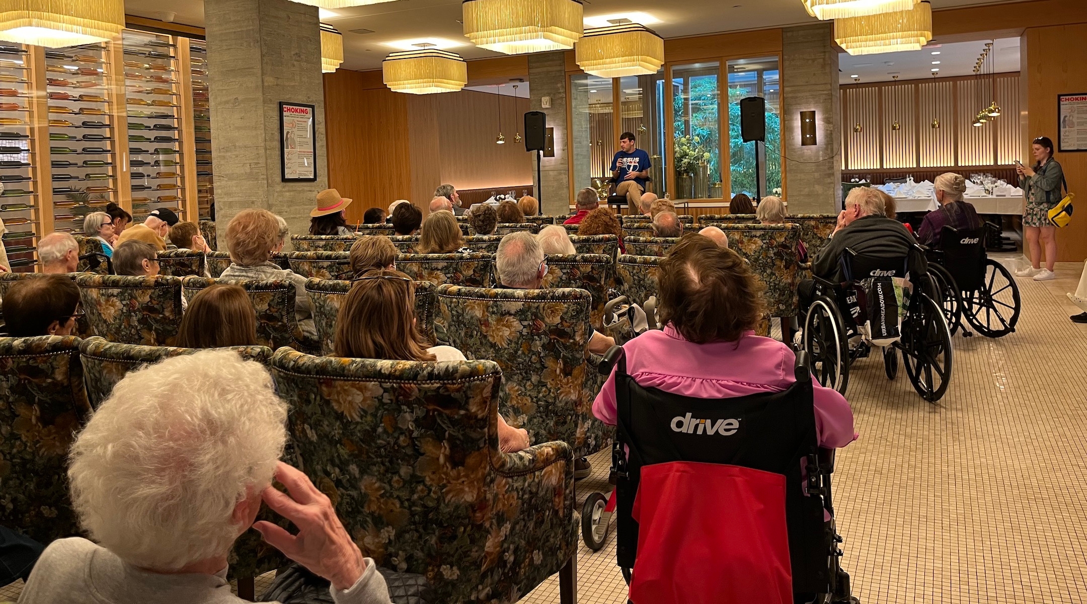 Jewish comedian Alex Edelman speaks to seniors at Inspir Jewish Living about his solo Broadway show “Just for Us.” (Julia Gergely)