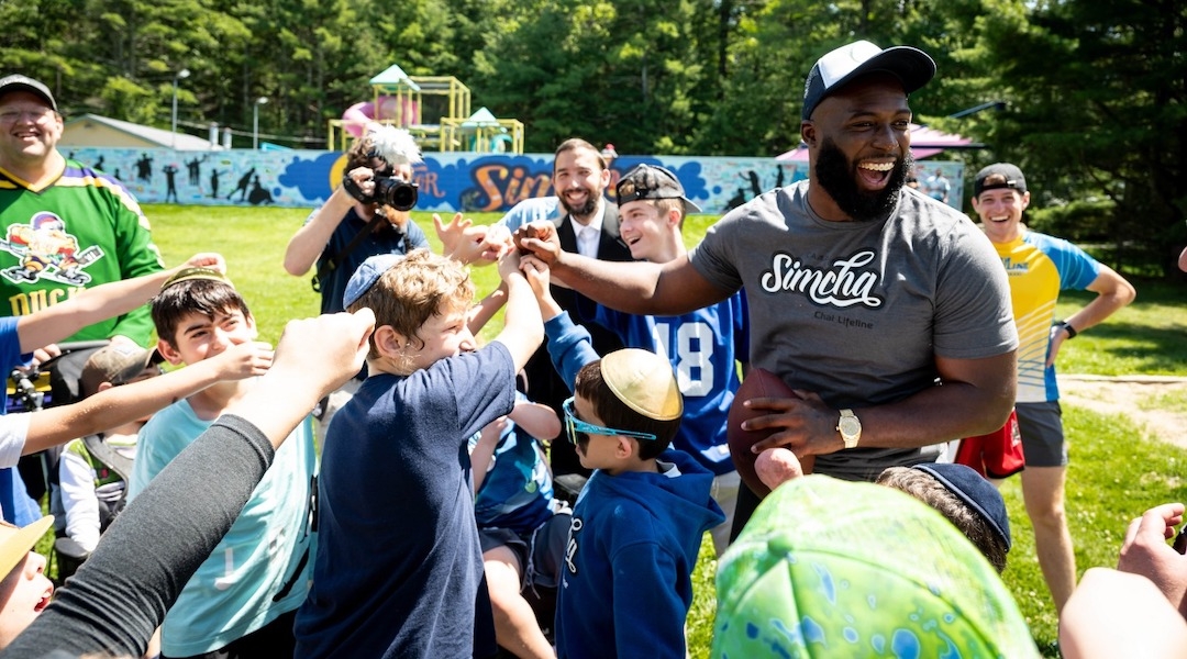 Leonard Fournette visited Camp Simcha in Glen Sprey, New York, Aug. 13, 2023. (Courtesy of Camp Simcha)