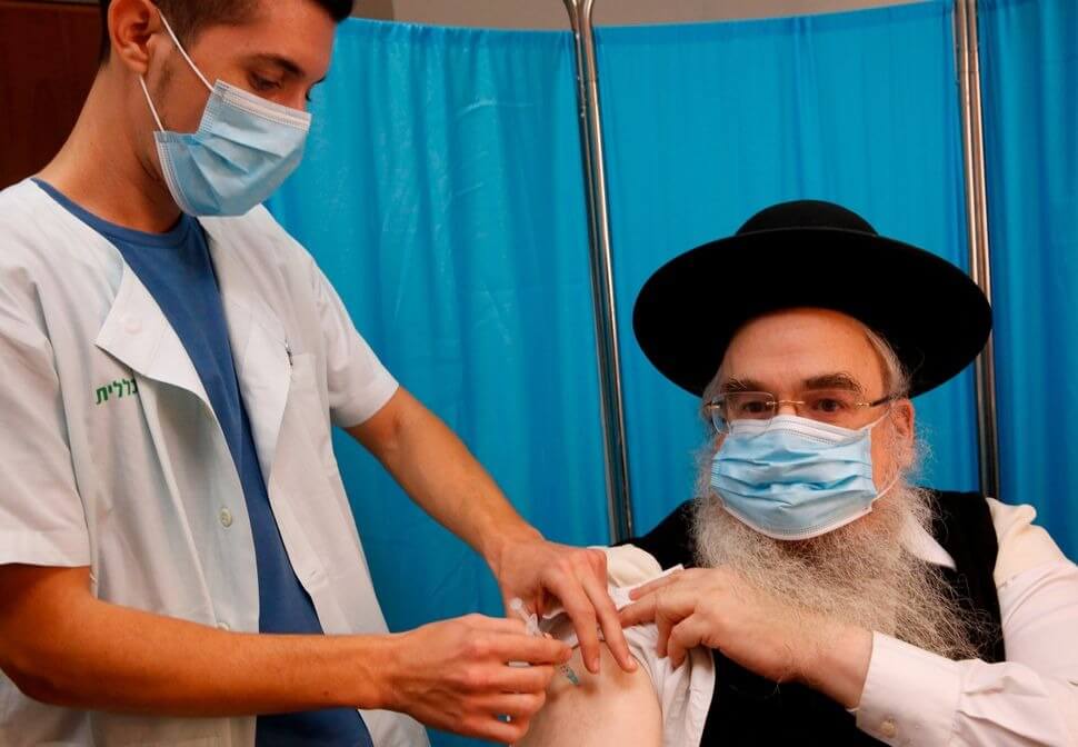 A Jewish man in Israel gets administered the COVID-19 vaccine in January, 2021.