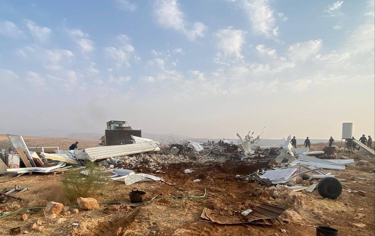 Remains of construction demolished by Israeli forces in a West Bank outpost on August 14, 2023.